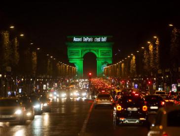 The Arc de Triomphe in France lit in green at night to celebrate the Paris accord.