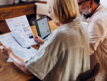 Older couple looking at energy bills