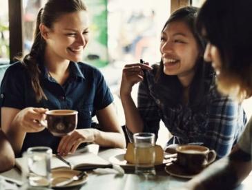 A group of friends having a meal together.
