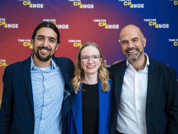 Three EDF colleagues, smiling.